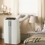 dual-hose-portable-air-conditioner-installed-in-a-bedroom